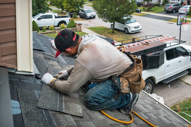 Professional Roofing technician working in Passaic, NJ